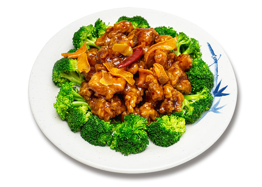 Orange chicken with crisp broccoli on an elegant blue-bamboo plate, studio shot