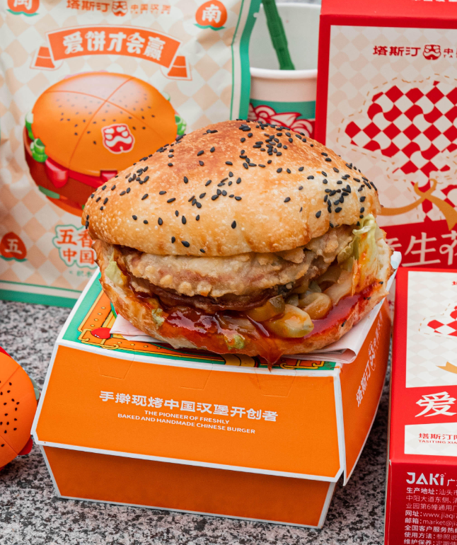 Handmade Tastien Chinese burger closeup on branded packaging