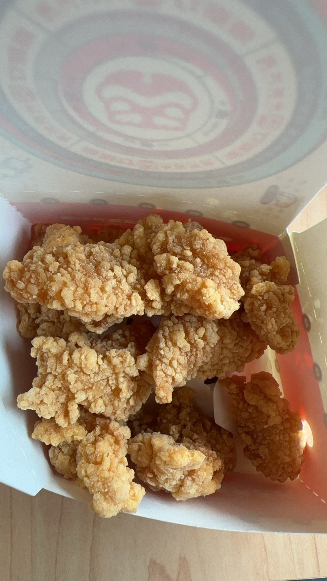 Crispy popcorn chicken in a Tastien takeout box